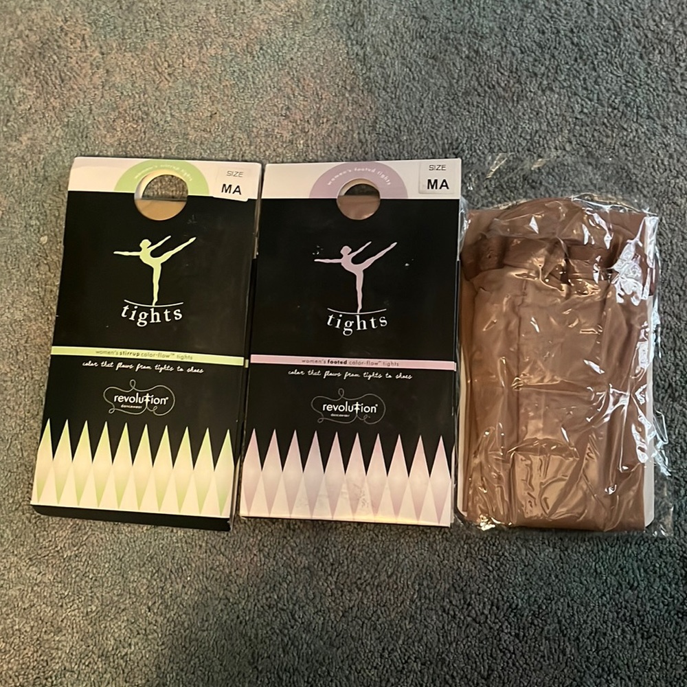 Womens footed and stirrup color flow tights. Still new and never worn!!